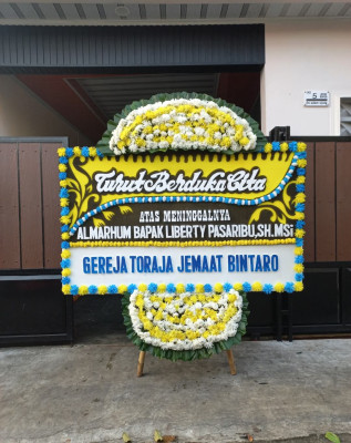 Papan Bunga Duka di Gelok Beam